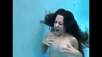 Topless girl drowning underwater