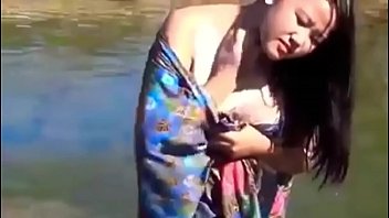 Girl Enjoying in River at jungle